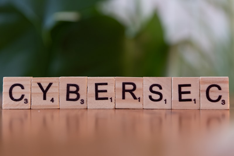 Wooden letter blocks spelling out CYBERSEC — representing the growing vocabulary of threats businesses must understand