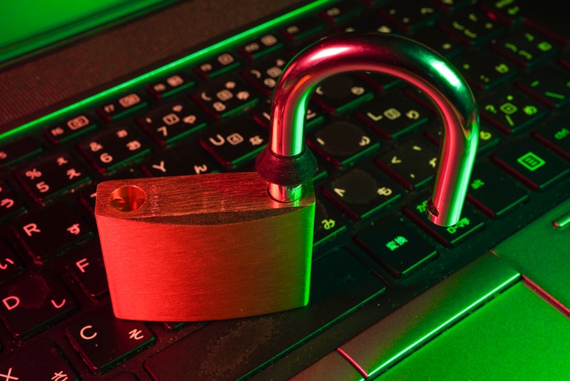 A red padlock on a keyboard — a reminder that locking down your systems is the first step in AI agent security